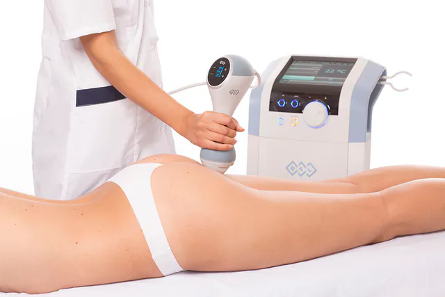 EMTONE treatment photograph, Square Mile Clinic, City of London EMTONE handpiece on the thigh for cellulite, treatment available at Square Mile Clinic, City of London